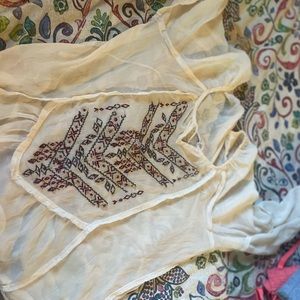 woman’s sheer blouse